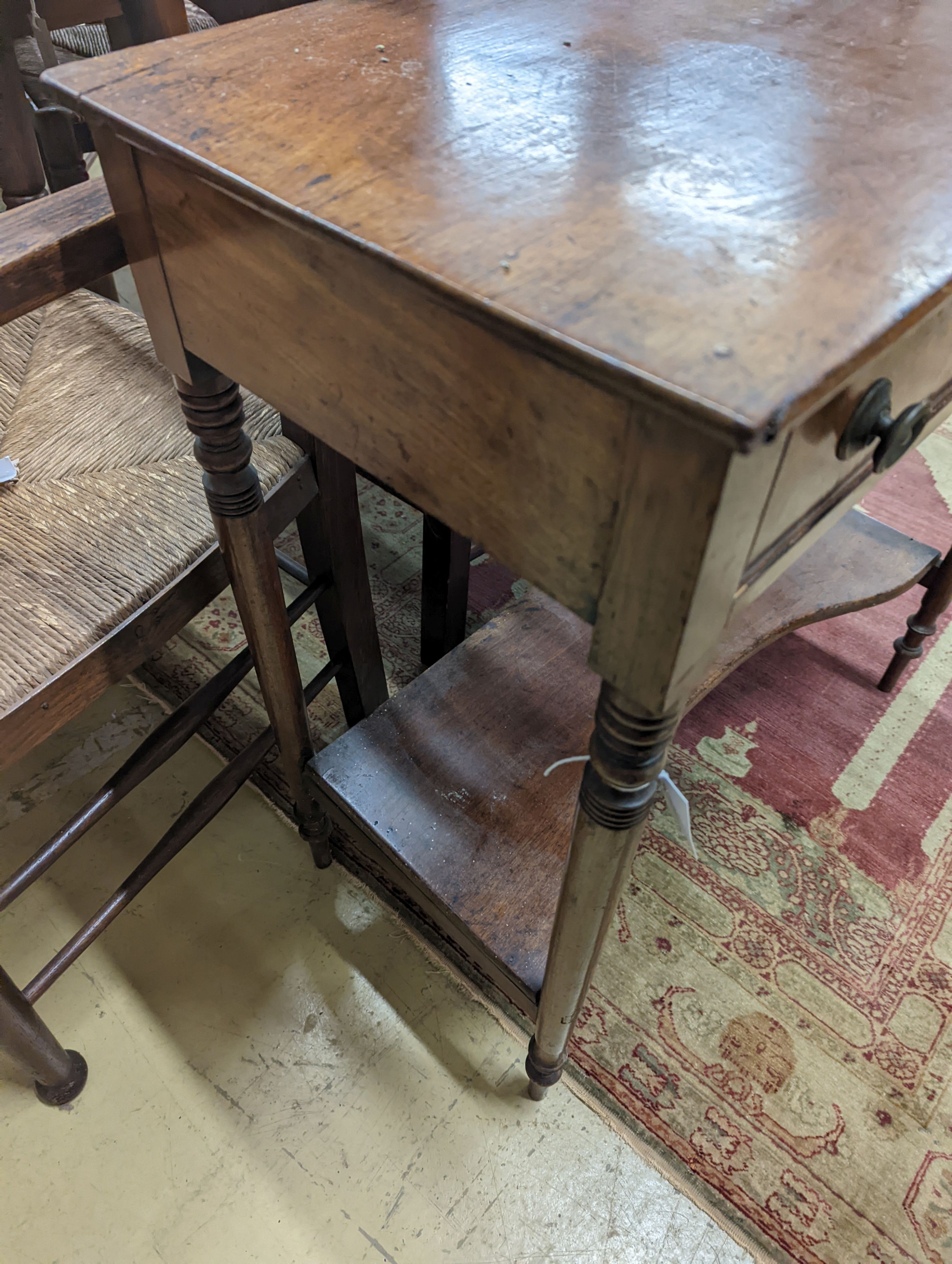 A Regency mahogany two tier side table, width 74cm, depth 36cm, height 77cm